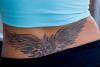 female_lower_back_tattoo.jpg